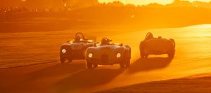 Vintage cars race into the sunset at Goodwood Revival