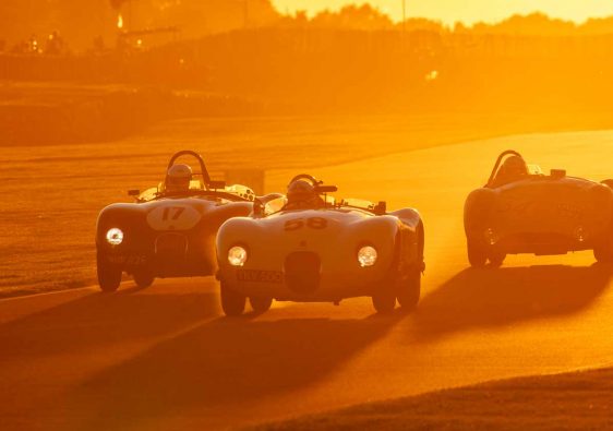 Vintage cars race into the sunset at Goodwood Revival