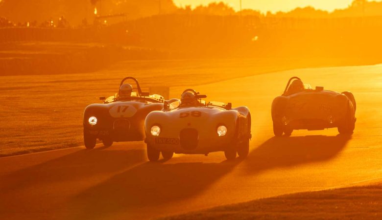 Vintage cars race into the sunset at Goodwood Revival