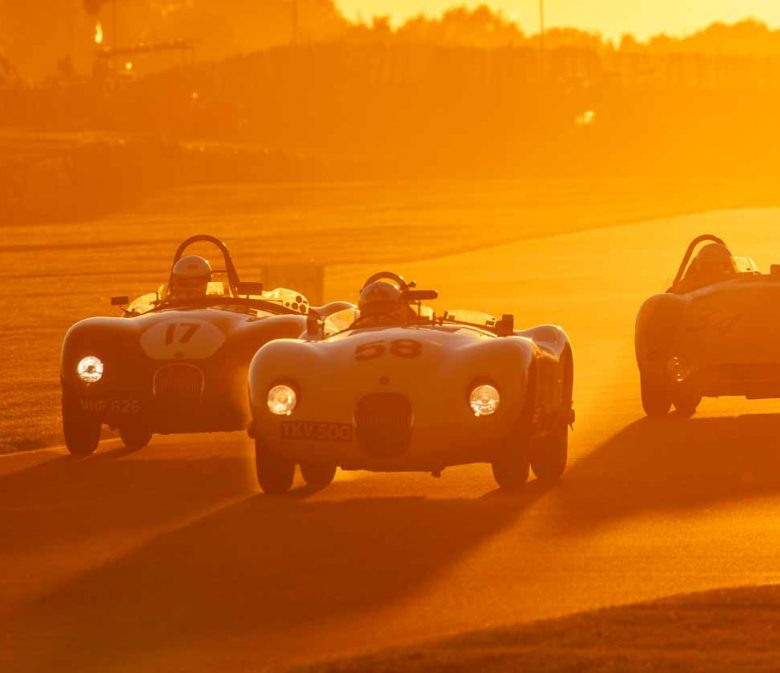 Vintage cars race into the sunset at Goodwood Revival