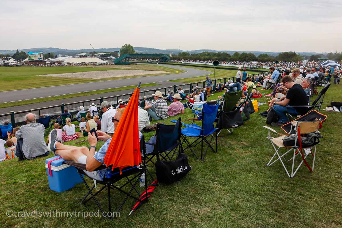 Spectators viewing from the side of the circuit at Goodwood Revival